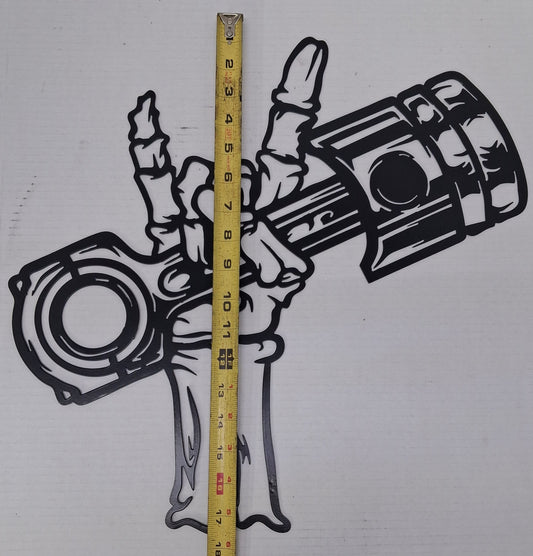Skull hand piston