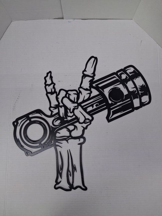 Skull hand piston